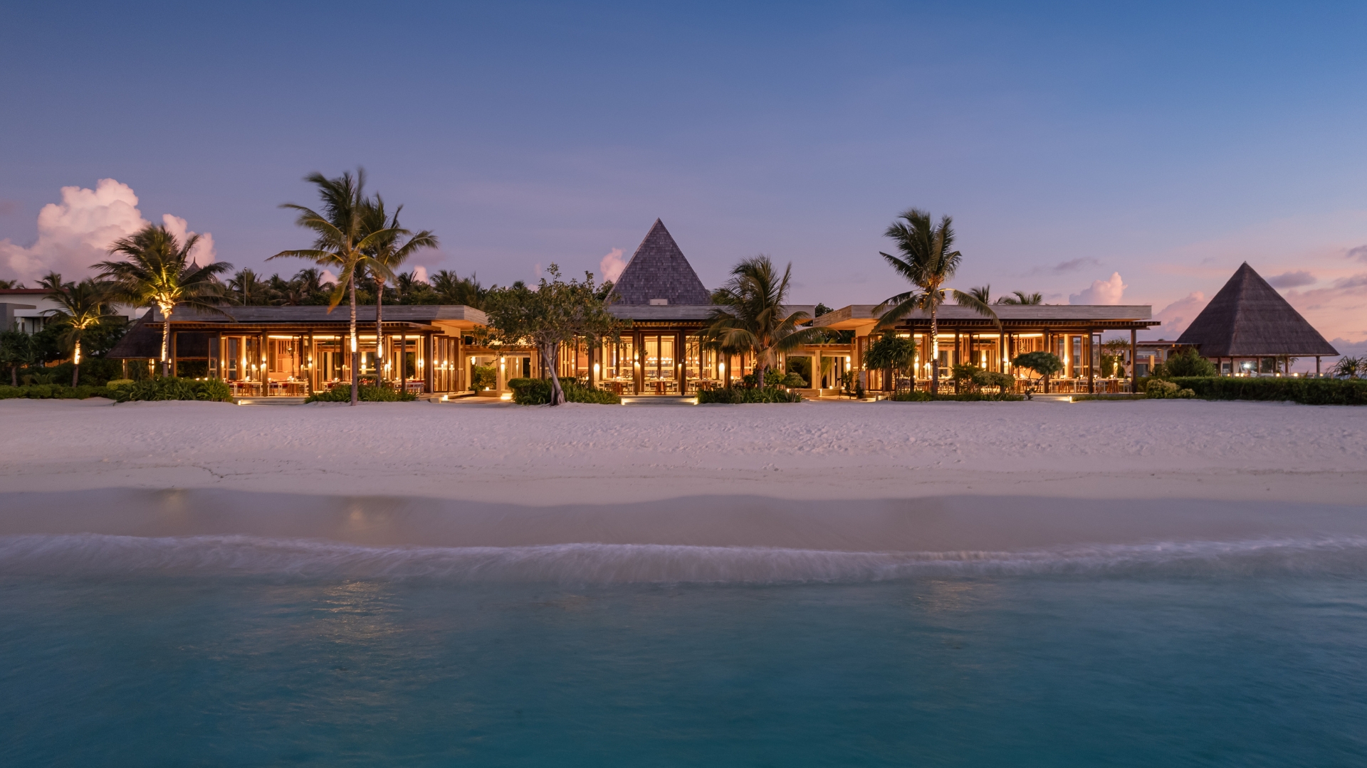 Dining area overlooking the water at Kuda Villingili Resort Maldives