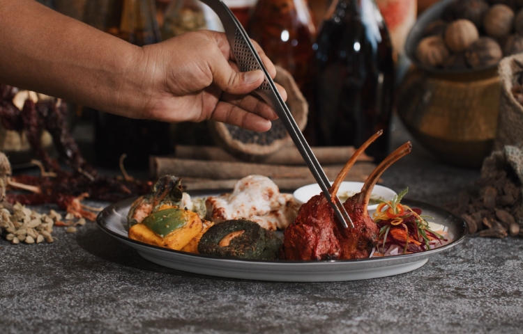 A plated dish of lamb at the Spice restaurant at Kuda Villingili Resort Maldives