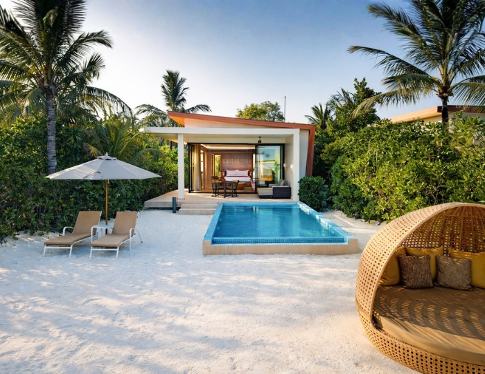 Exterior of a Sunrise Beach Villa at Kuda Villingili Resort Maldives.
