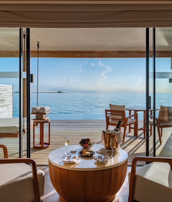 Sunrise Water Villa interior at Kuda Villingili Resort Maldives