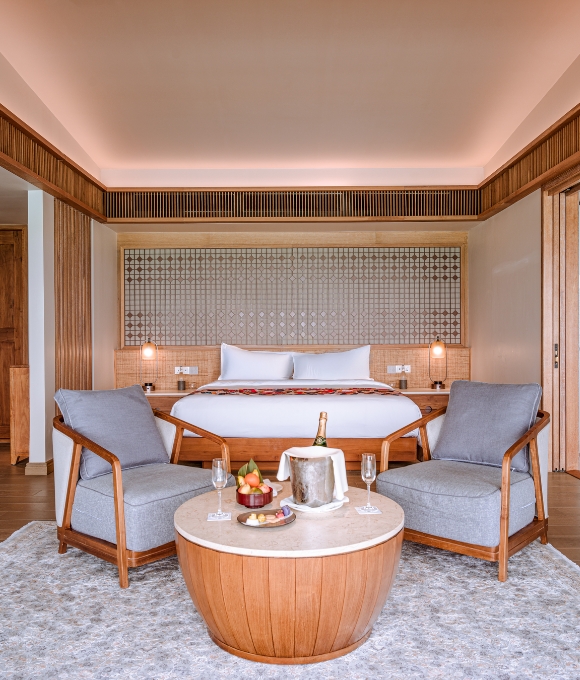 Sunrise Water Villa bedroom at Kuda Villingili Resort Maldives