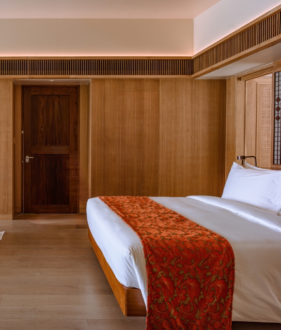 Sunset Beach Villa bedroom interior at Kuda Villingili Resort Maldives