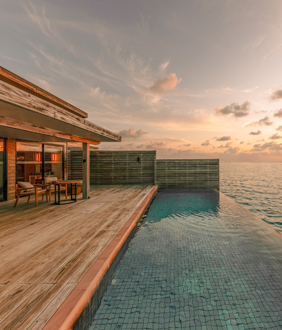 Sunset Water Villa deck view at Kuda Villingili Resort Maldives