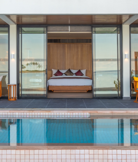 Two Bedroom Beach Pool Villa bedroom and pool at Kuda Villingili Resort Maldives