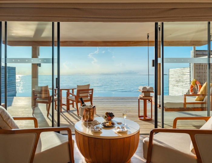 Sunset Water Villa with private pool interior at Kuda Villingili Resort Maldives