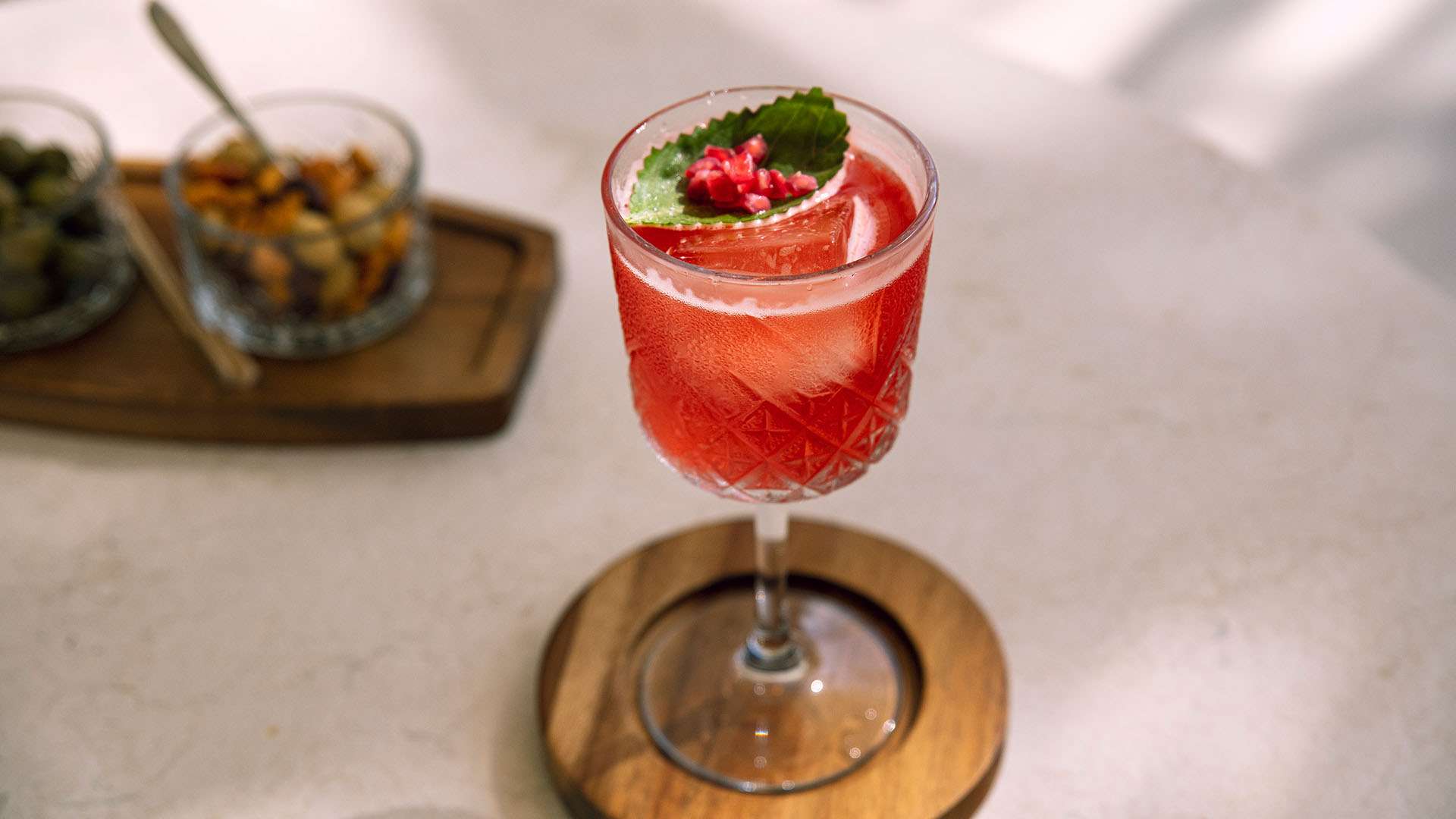 Refreshing red drink topped with a garnish at Kuda Villingili Maldives