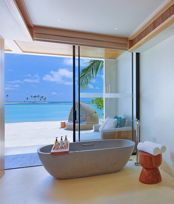 Oceanfront villa at Kuda Villingili Maldives with bathtubs and modern interior design