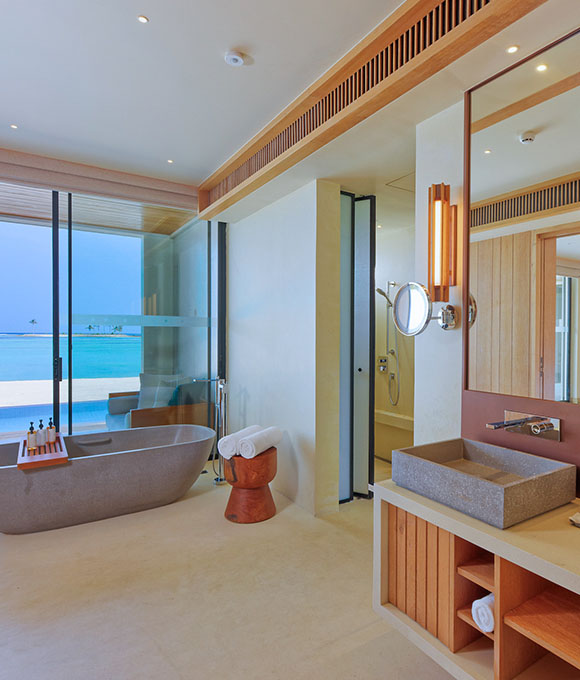 Oceanfront villa at Kuda Villingili Maldives with bathtubs and modern interior design