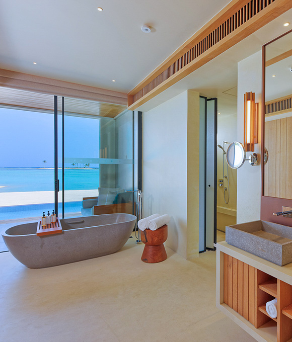 Oceanfront villa at Kuda Villingili Maldives with bathtubs and modern interior design