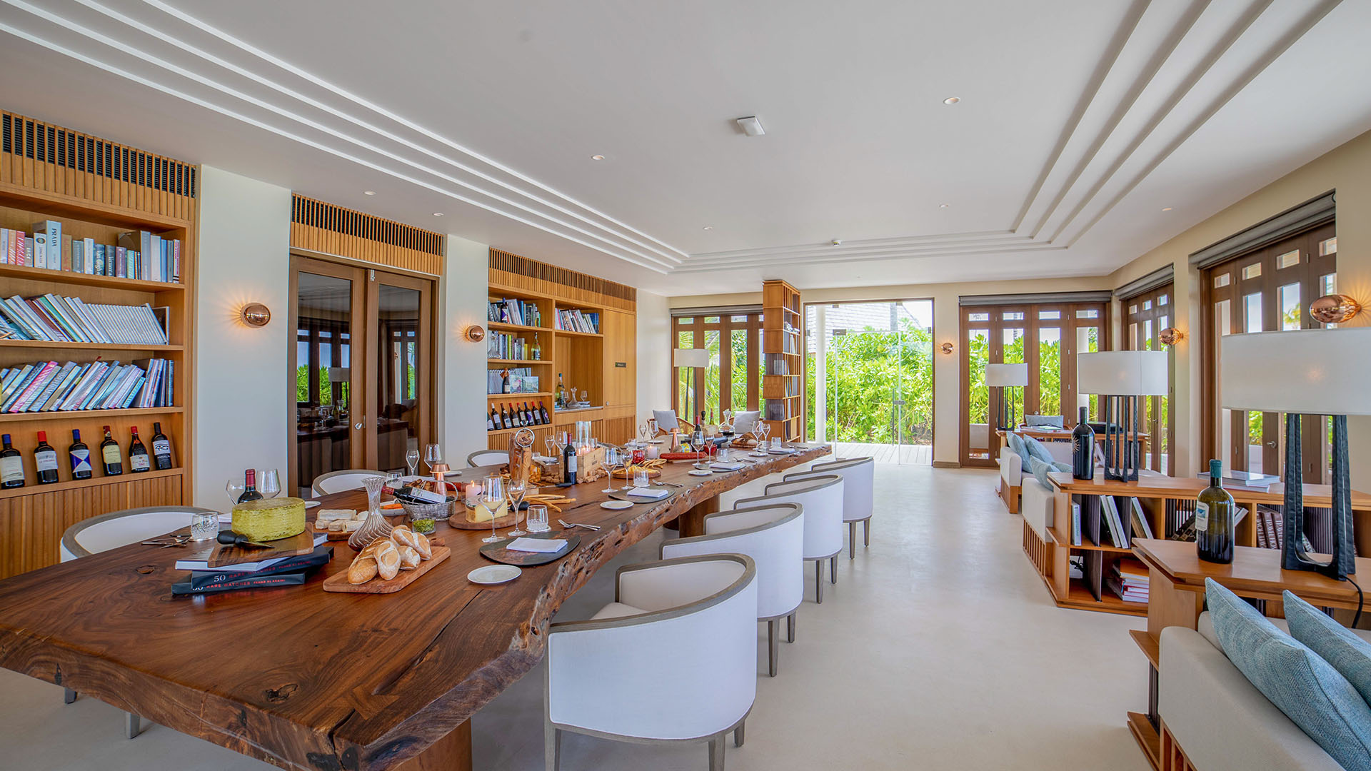 Dining setup featuring a table for wine and dinner at the Library in Kuda Villingili