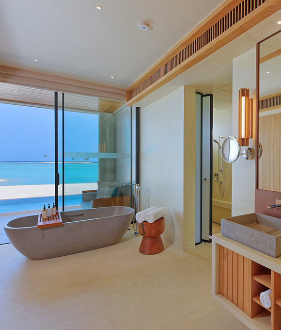 Oceanfront villa at Kuda Villingili Maldives with bathtubs and modern interior design
